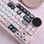 Original Sin Keycap Set in black and pink, showcasing its unique MOA profile from multiple artistic angles. This PBT keycap set blends dark allure.