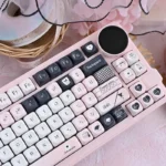Original Sin Keycap Set, black and pink MOA profile keycaps, showcased from multiple angles, highlighting their artistic dark allure and cute charm.