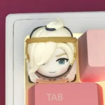 Artistic handcrafted resin Overwatch Mercy keycap, showcasing the iconic angelic hero's intricate details for a premium gaming collectible.