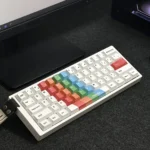 Close-up of a vibrant, intricately painted PBT keycap set, showcasing its unique artistic dye-sublimated design for custom mechanical keyboards.