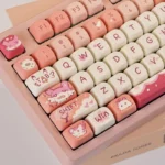 Whimsical Palworld Chillet MOA PBT gaming keycap set, showcasing adorable Chillet art on keys from a unique angle, an exclusive collectible setup.