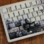Ice Core side-engraved PBT backlit keycaps set in an elegant ice-themed gallery, highlighting their minimalist design and ethereal glow from multiple angles.