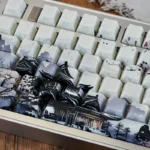A collection of Ice Core PBT backlit keycaps set, showcasing their elegant ice-themed design and ethereal side-engraved legends from various angles.