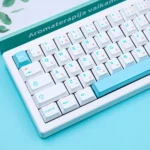 Ice Berry Pink Sky Blue PBT dye-sub keycap set from various angles. Shows durable PBT, refreshing pastel colors, and serene aesthetic.