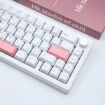 Ice Berry Pink Sky Blue PBT Dye-Sub keycap set, showcasing durable PBT and refreshing pastel hues from multiple serene, artistic angles.