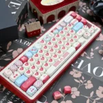 Sweet Cherry PBT keycap set for mechanical keyboards, featuring multiple artistic views of its nostalgic design, soft pastel colors, and durable material.