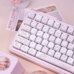 Sweet Milk Candy pink PBT keycaps set, MOA profile. Views show charming pastel colors, rounded, candy-like aesthetic, and ergonomic design.