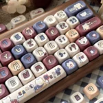 Vibrant PBT MOA Gaming World keycaps set displayed from a dynamic angle, highlighting bold gaming legends and ergonomic profile for immersive, playful game design.