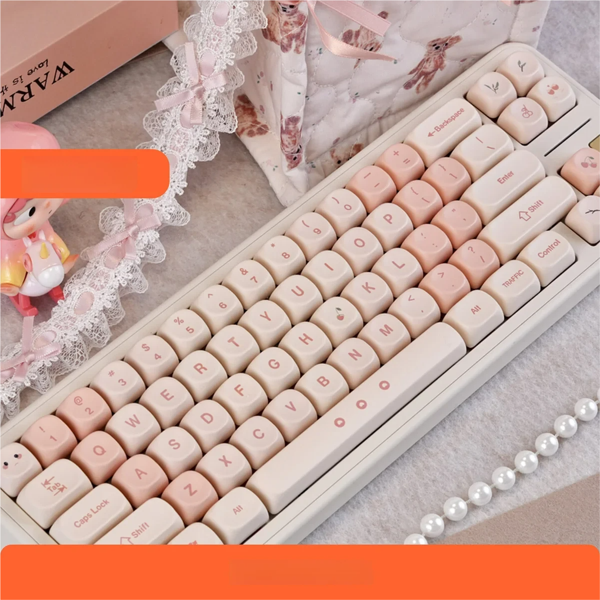 Charming Pink Cherry MOA PBT Keycap Set, beautifully displayed with soft pink hues and delicate cherry blossom motifs on spherical keycaps.