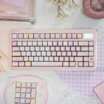 Adorable pink Pixel Cat Keycaps set made from durable PBT, featuring charming pixel art cats for a playful retro keyboard look.