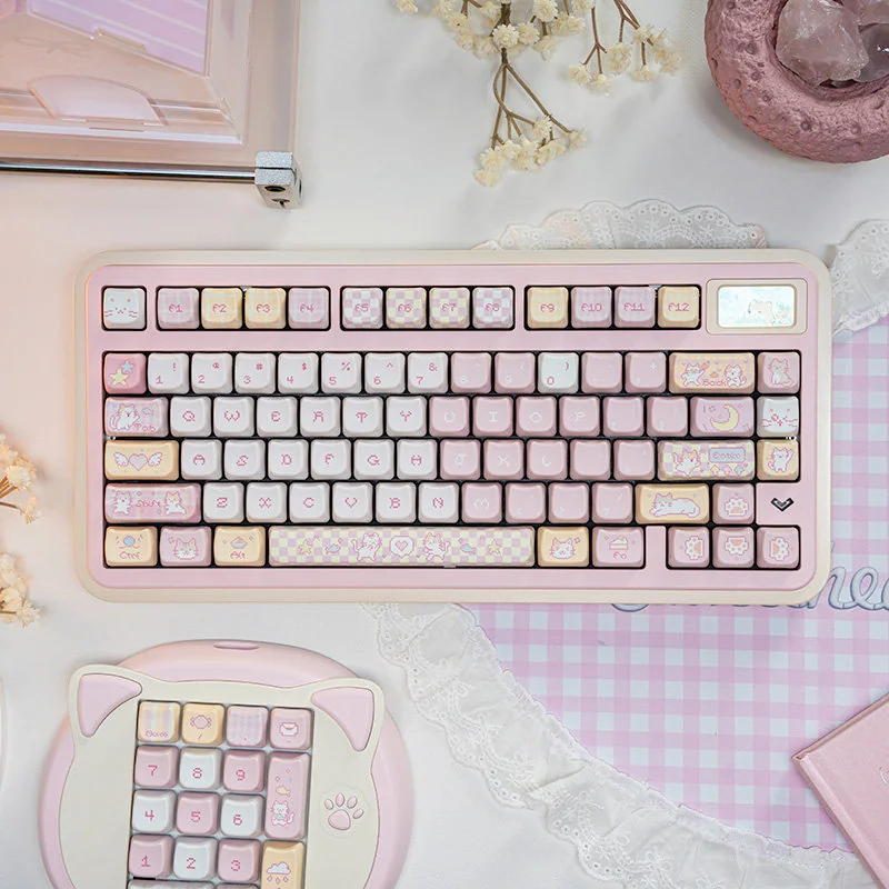 Adorable pink Pixel Cat Keycaps set made from durable PBT, featuring charming pixel art cats for a playful retro keyboard look.