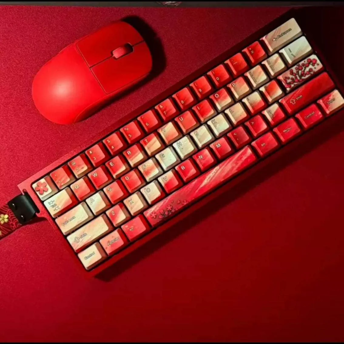 Vibrant red plum blossom art on durable PBT dye-sublimated keycaps set, displayed from multiple angles to highlight exquisite East Asian design.