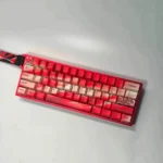 Gallery views of Plum Blossom Keycaps Set, highlighting vibrant red dye-sublimated art on durable PBT, capturing the serene beauty of East Asian tradition.