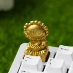 PvZ Sunflower Trophy Artisan Keycap, a collectible, angled view, highlighting vibrant gold/silver trophy design for ESC gaming.