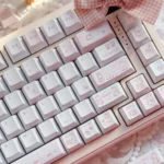 Unique Rabbit Bear PBT keycaps set collection, featuring charming pastel illustrations of the story set from various angles. A whimsical and playful keyboard.