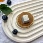 Multiple angles reveal the premium aluminum adorable rabbit keycap, highlighting its charming design, polished finish, and dessert-inspired.