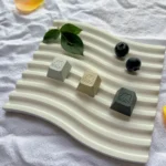 Close-up of an adorable rabbit keycap, showcasing its premium polished aluminum and charming pastel, dessert-inspired design for ESC R4.