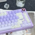 Close-up of the whimsical Rabbit PBT keycap set, highlighting vibrant dye-sublimated rabbit art and the durable PBT texture for an artistic keyboard.