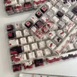 A close-up view of the Red and Black Rose PBT Dye-Sub Keycap Set, revealing its intricate floral patterns, durable texture, and dramatic gothic elegant.