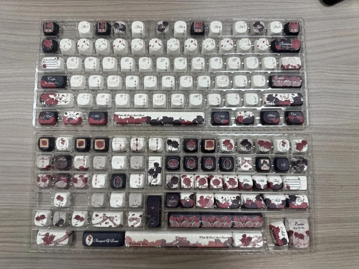 Multiple angles of the Rose PBT Dye-Sub Keycap Set, showcasing durable PBT and intricate gothic floral art, with dramatic elegance.
