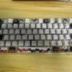 Detailed view of the Red & Black Rose PBT Dye-Sub Keycap Set, revealing the durable PBT and striking gothic rose patterns from an artistic perspective view.