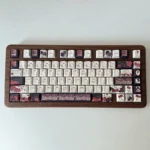 Striking Red & Black Rose PBT Dye-Sub Keycap Set, showcasing durable PBT with intricate gothic floral designs for elegant keyboards.