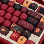 Stunning Red Heart Queen PBT Dye-Sub MOA keycaps set, showcasing a regal red and black design with intricate card suit details.