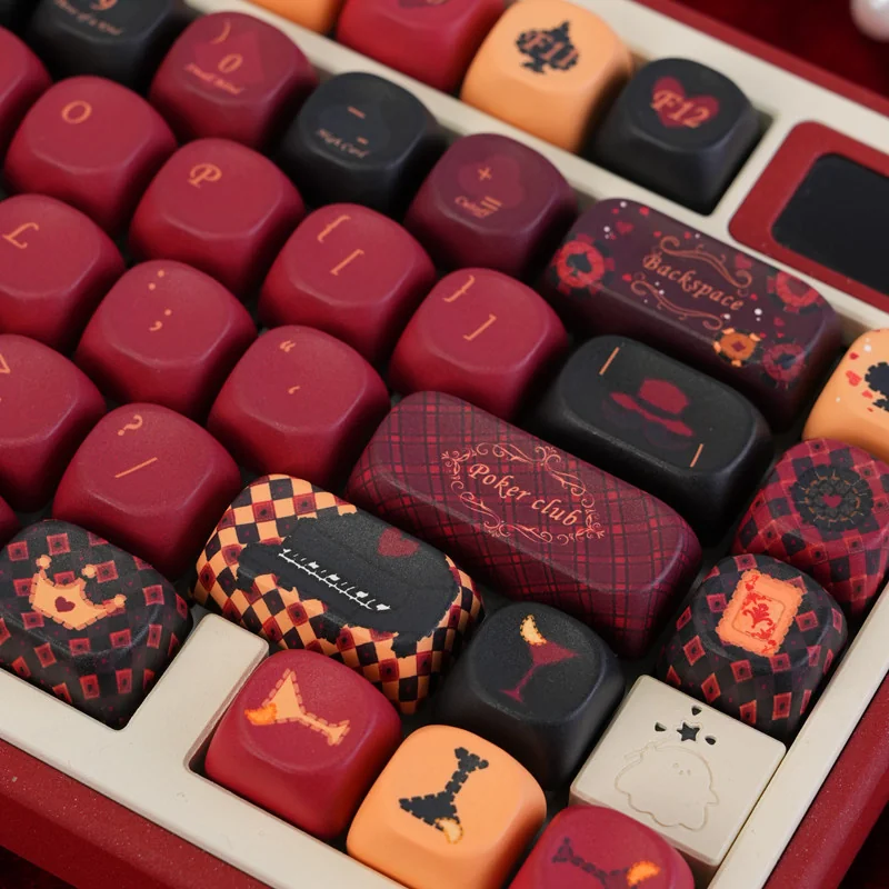 Stunning Red Heart Queen PBT Dye-Sub MOA keycaps set, showcasing a regal red and black design with intricate card suit details.