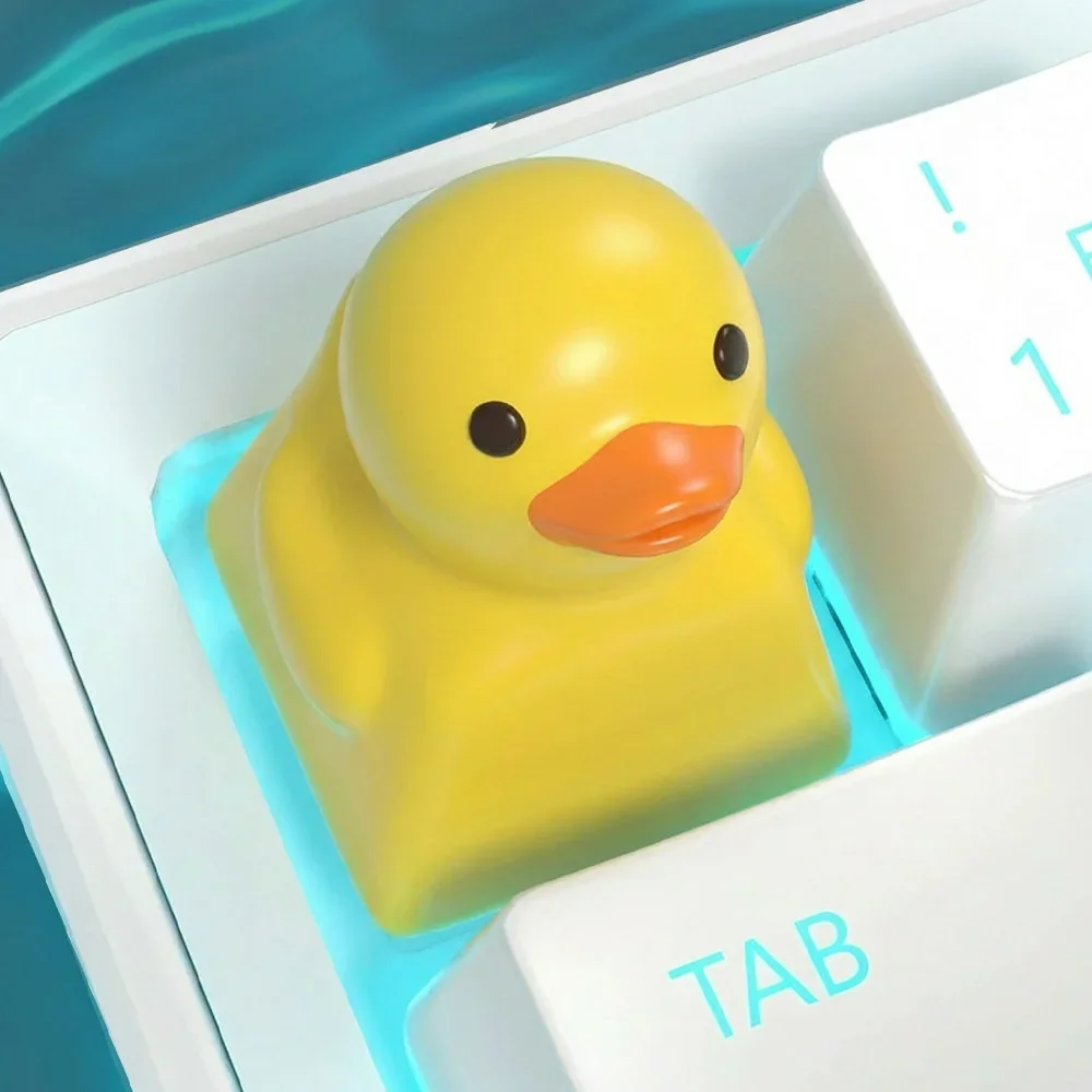 Main image of a handcrafted resin Playful Duck Keycap, featuring an adorable little yellow duck for whimsical keyboard charm.
