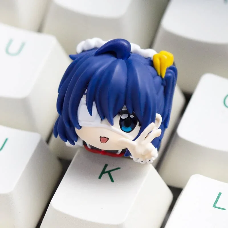 Explore the exclusive Rikka Takanashi artisan resin keycap from various angles, detailing its vibrant Chunibyo anime art for unique keyboard personality.