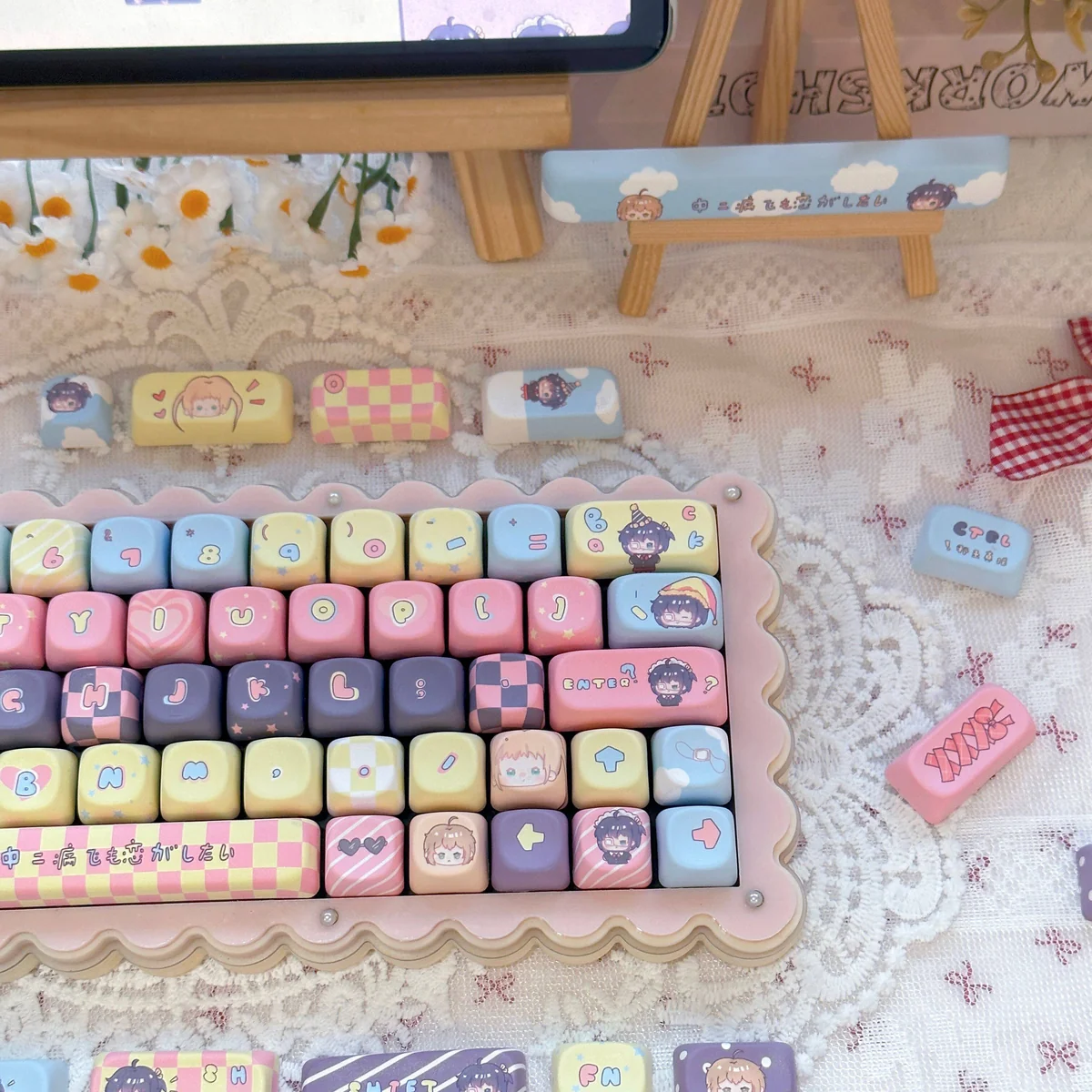 Vibrant Rikka Takanashi anime keycaps set, a whimsical MOA set, displayed from multiple angles. Features playful character art and delicate floral accent.