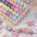 Vibrant Rikka Takanashi anime keycaps set in MOA profile, featuring whimsical character art and playful iconography, displayed from various angles.