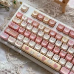 Rilakkuma MOA profile PBT keycaps set, showing whimsical Rilakkuma and Kaoru characters in pastel hues from various angles. Ergonomic and durable PBT material.