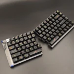 Republic of Gamers: ROG Logo Split Space Key Keycaps showcasing its bold, sculpted gaming design from multiple angles, highlighting its metallic finish.