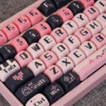 Sweetheart Black Pink Romantic PBT Keycaps MOA profile set, shown from multiple angles. Emphasizes the charming, playful design and durable PBT material.