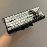 Unique Samurai Ronin PBT Keycaps set, displayed from multiple angles. Features monochromatic Japanese samurai art and intricate, stylized character.