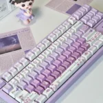 Durable PBT Dye-Sub Rose Butterfly keycaps set, displaying nature-inspired rose and butterfly artistry from a unique angle.