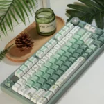 Elegant rose butterfly PBT dye-sub keycaps set, showcasing durable PBT construction and intricate, nature-inspired rose and butterfly art from a unique design.