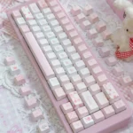 Exquisite Rose Whisper PBT Dye-sub Rose Keycap Set gallery, displaying delicate rose motifs and soft hues for a serene desktop.