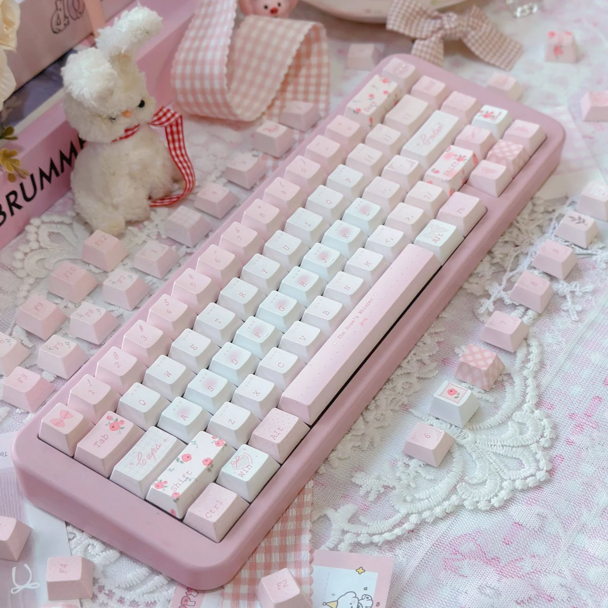 Exquisite Rose Whisper Dye-sub PBT Rose Keycap Set, beautifully displaying delicate rose motifs and soft romantic hues for a serene, artistic desktop.