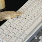 Exquisite Rose Dye-Sub PBT Keycap Set, showcasing detailed artistic floral designs from various angles, evoking a sophisticated blooming garden style.