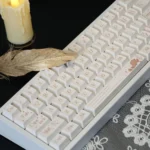 Elegant White Rose Keycap Set (139 keys) featuring exquisite dye-sub PBT floral designs, evoking a sophisticated blooming garden aesthetic.