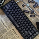 Artistic black rose 139-key PBT dye-sub keycap set, showcasing intricate dark floral patterns for a unique and sophisticated keyboard aesthetic.