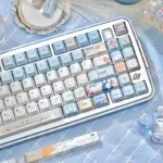 Sacred Mountain PBT keycaps set in a gallery view, displaying their serene, Asian-inspired art of majestic mountains and ethereal clouds from various angle.