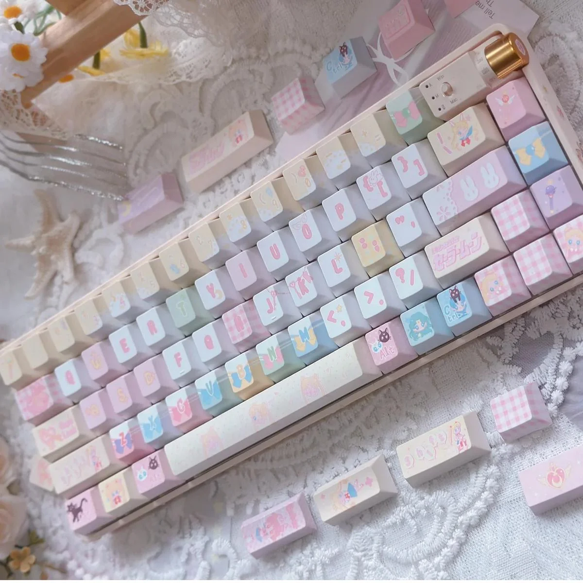 Complete 130-key PBT dye-sub Sailor Moon Keycaps set, showcasing vibrant pastel anime characters and magical motifs for a playful keyboard aesthetic.