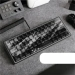 Elegant Black Sakura PBT Keycaps Set, exquisitely adorned with delicate plum blossom artistry, highlighting their durable, premium quality.