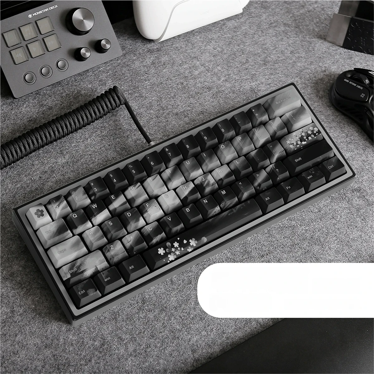 Elegant Black Sakura PBT Keycaps Set, exquisitely adorned with delicate plum blossom artistry, highlighting their durable, premium quality.