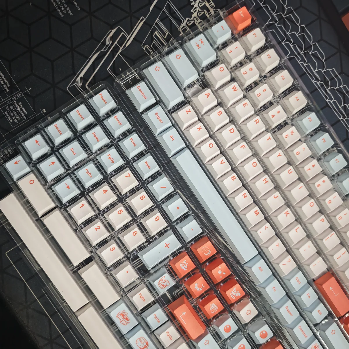 Vibrant Salmon PBT keycaps set, showcasing artistic dye-sublimated designs and oceanic hues from multiple angles. Cherry profile for a fresh desk aesthetics.