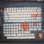 Vibrant, dye-sublimated Salmon PBT Keycaps Set (Cherry profile) displaying salmon-inspired colors, oceanic hues, and playful textures from various angles.