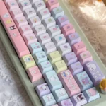 A delightful array of vibrant Sanrio PBT Dye-Sub keycaps set, featuring iconic characters from multiple playful angles, ready to transform any kawaii keyboard.